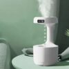 Anti-Gravity Water Drop Humidifier clock with water drip design, perfect for home decor and air moisture control.