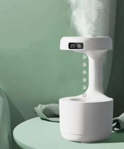 Anti-Gravity Water Drop Humidifier clock with water drip design, perfect for home decor and air moisture control.