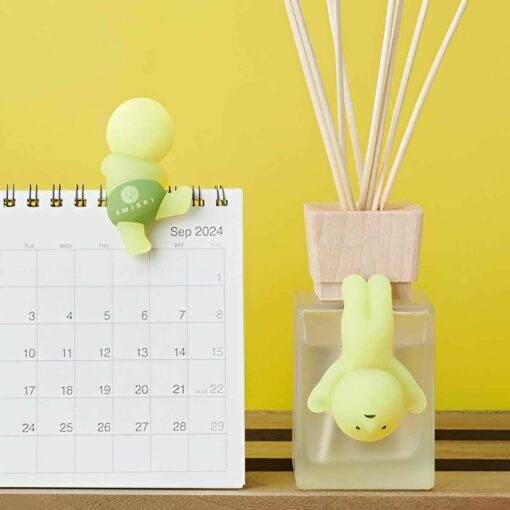Cute character desk decor with 2024 calendar and diffuser. Fun office accessory for organization and aromatherapy.