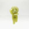 Quirky green silicone figure designed for versatile pop culture decoration and desk accessory.