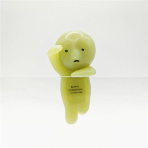 Quirky green silicone figure designed for versatile pop culture decoration and desk accessory.