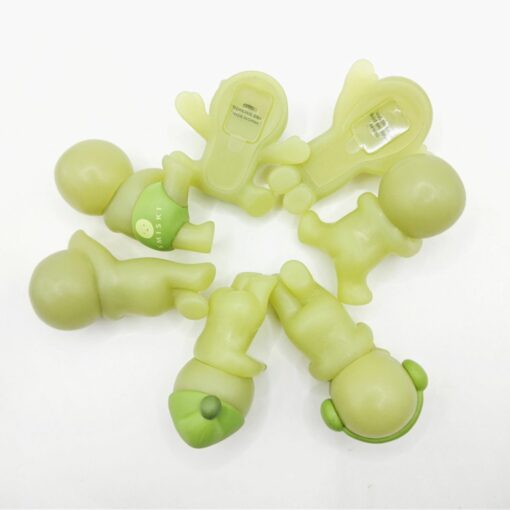 Glow-in-the-dark Smiski figures in creative poses, perfect for night lighting or cute decorations.