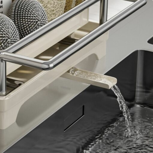Expandable dish rack with water drainage spout over sink, featuring stainless steel frame and space for kitchen accessories.